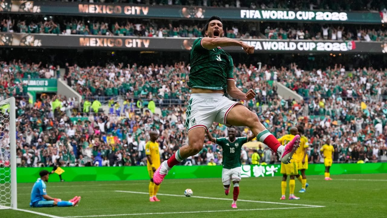 Mexico make winning World Cup start in red-card feast