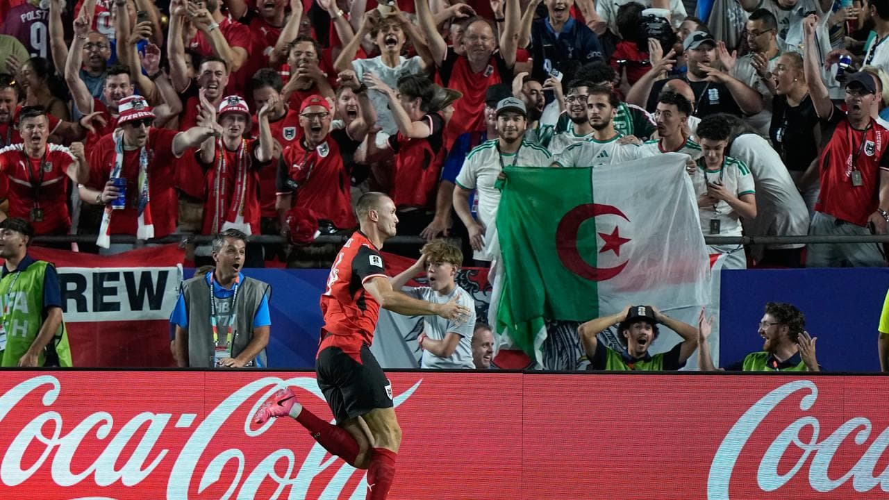 Austria and Algeria draw to both progress at World Cup