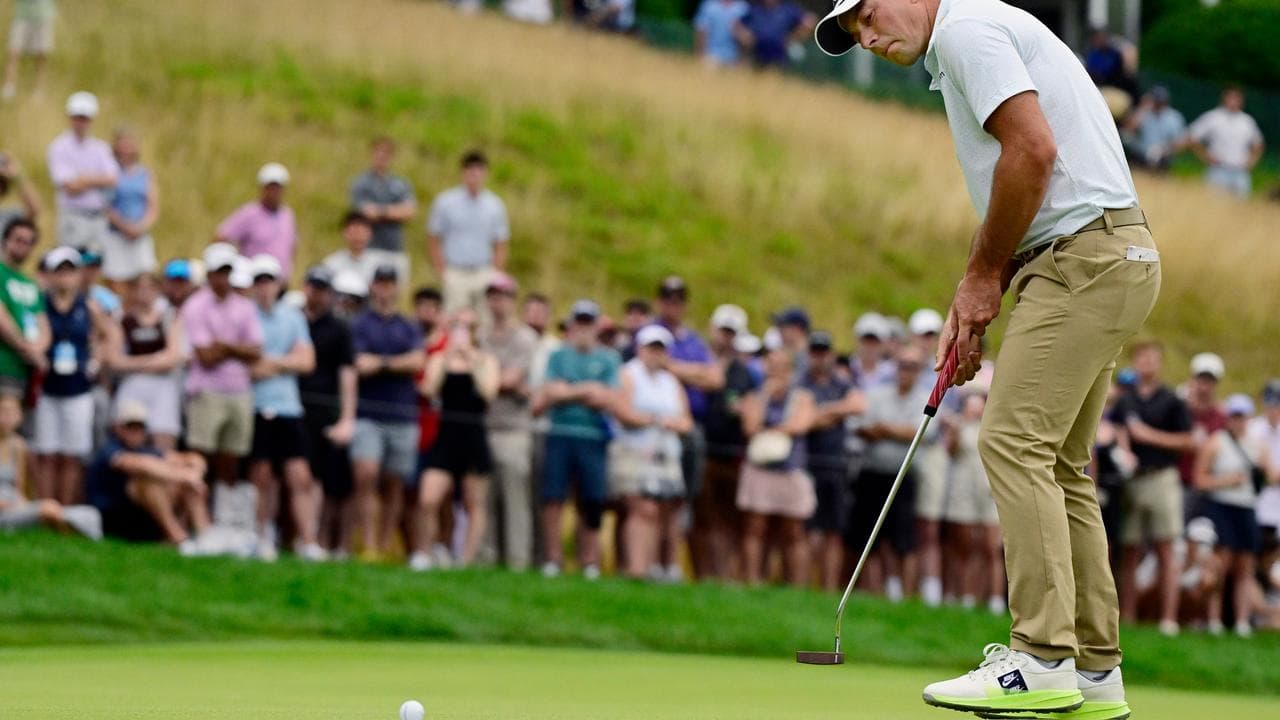 Hovland wins Travelers playoff after Scheffler miss