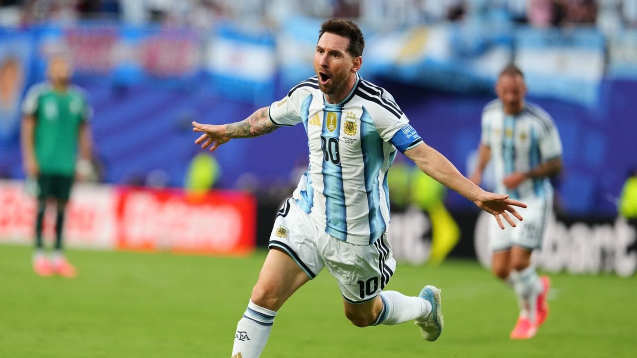 Messi magic gets defending champions going at World Cup