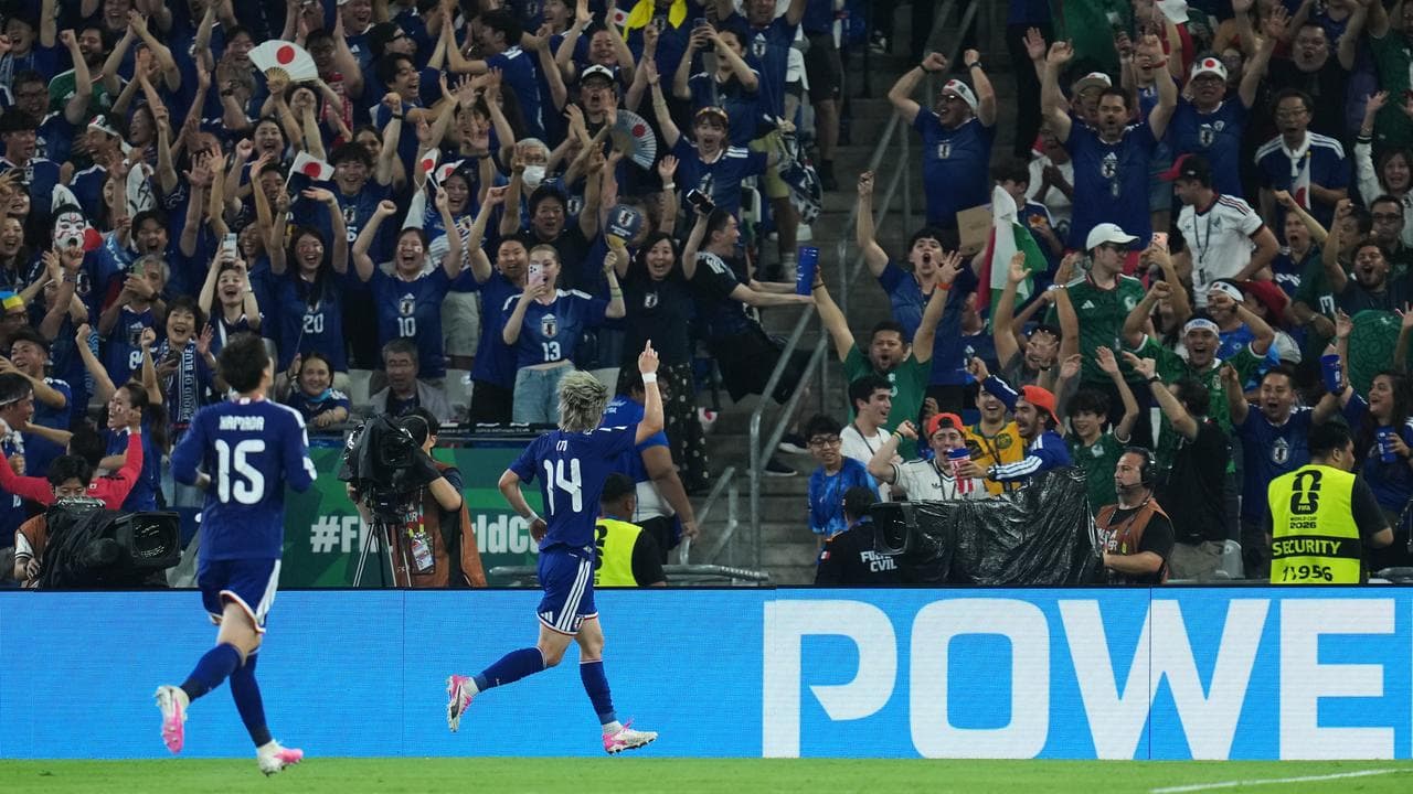 Japan heap more misery on Tunisia at World Cup
