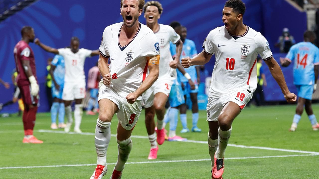 Kane's magnificent double keeps nervy England alive
