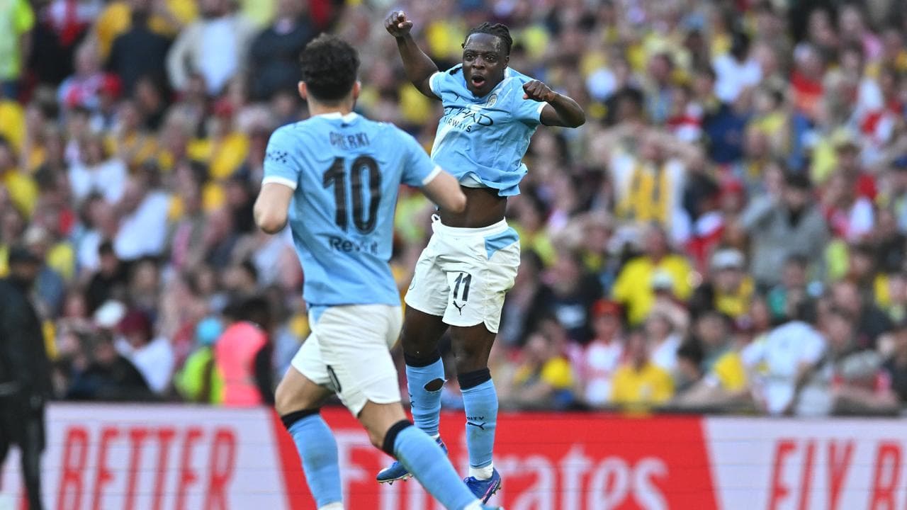 Man City reach FA Cup final as Arsenal go top of EPL