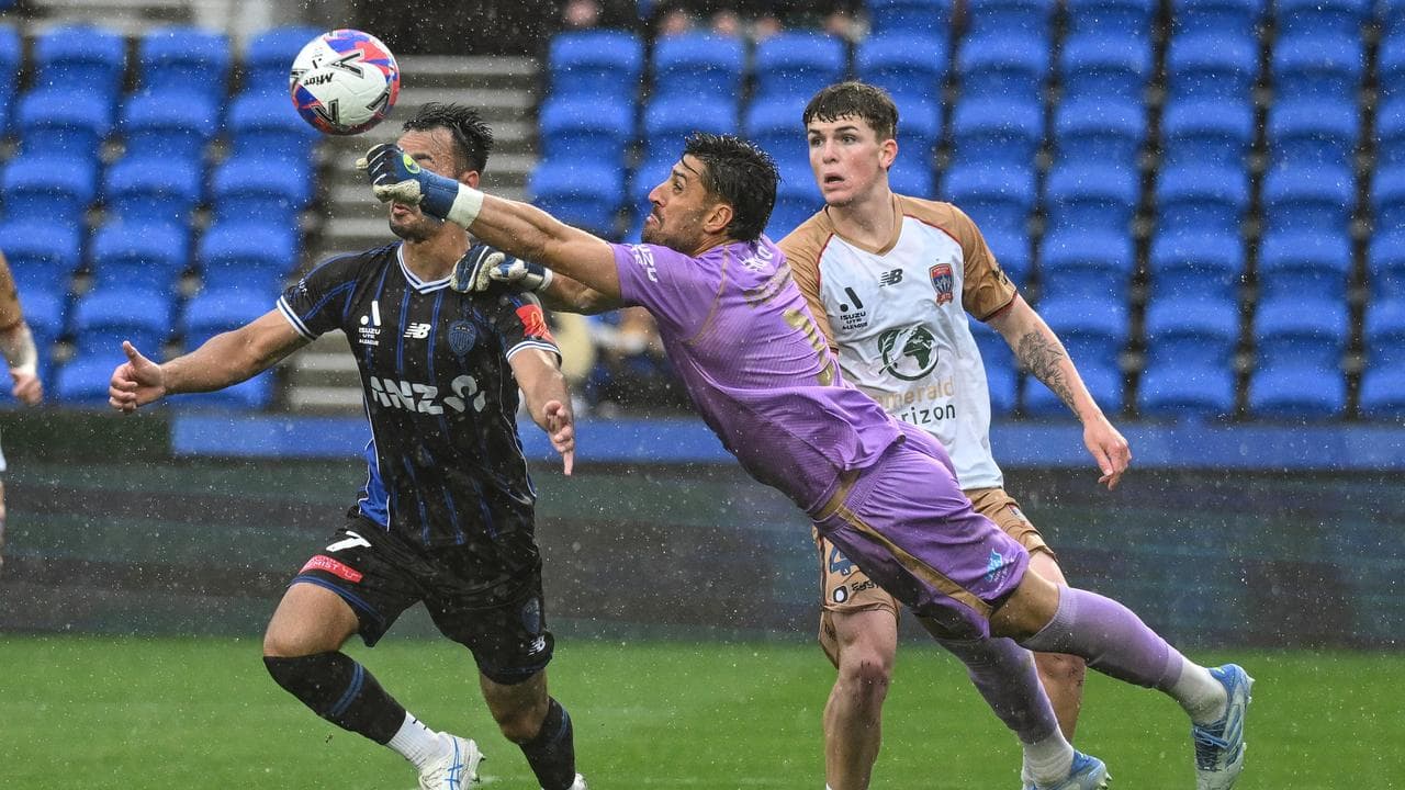 Jets battle through downpour to beat Auckland FC