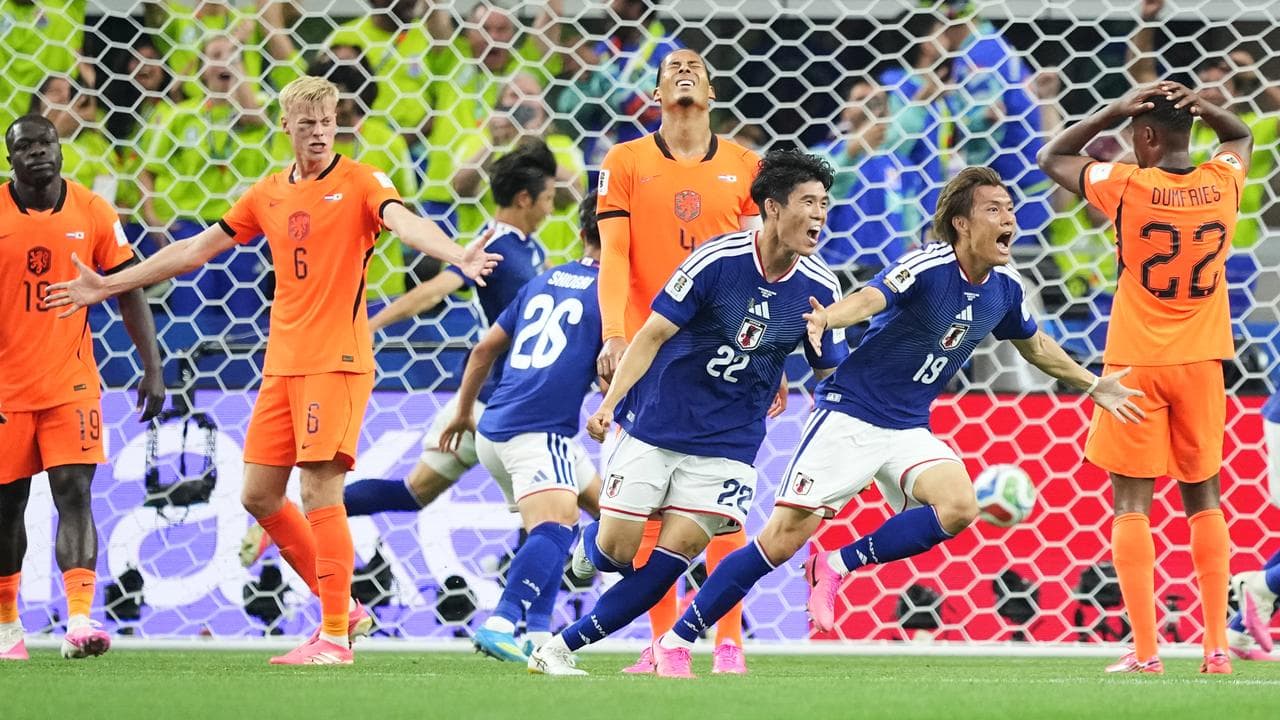 Japan rally twice for gritty draw with Netherlands